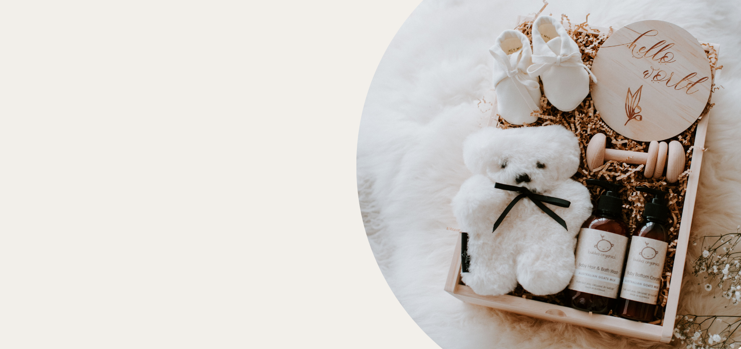 Kate Inglish Designs Baby Hamper Banner showcasing a beautifully curated baby gift hamper with high-quality, stylish items perfect for new parents and babies.